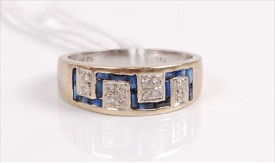 Lot 416 - An 18ct gold, sapphire and diamond set ring,...