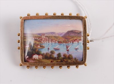 Lot 419 - A continental painted porcelain brooch, finely...