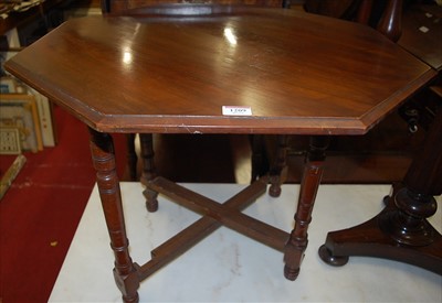 Lot 1209 - An Edwardian walnut octagonal X-frame folding...