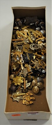 Lot 705 - A collection of military cap badges...