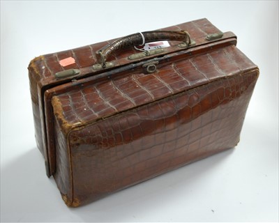 Lot 712 - A circa 1900 gent's crocodile skin travel case,...