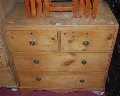 Lot 1266 - An Edwardian pine low chest of two short over...