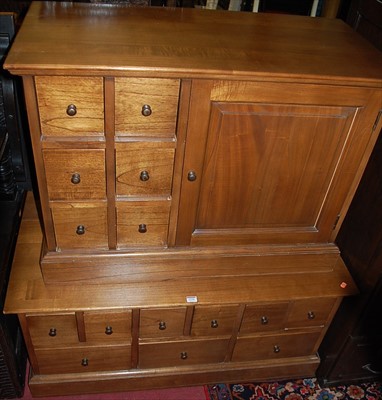 Lot 1270 - A contemporary hinged top low chest fitted...