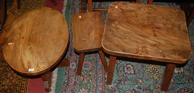 Lot 1277 - Two rustic elm low occasional tables, together...