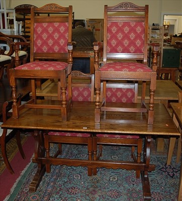 Lot 1286 - A contemporary Old Charm oak dining suite...