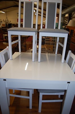 Lot 1295 - A contemporary white laminate breakfast table...