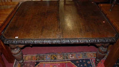 Lot 1300 - A late 19th century heavily carved oak...