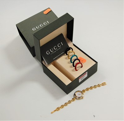 Lot 647 - A lady's Gucci gold plated cased cocktail...