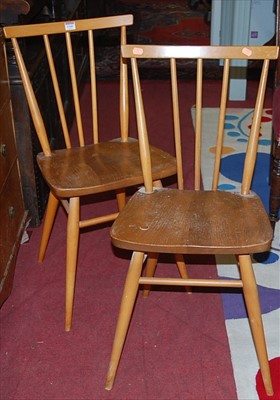 Lot 1340 - A pair of 1960s Ercol blond elm stickback...