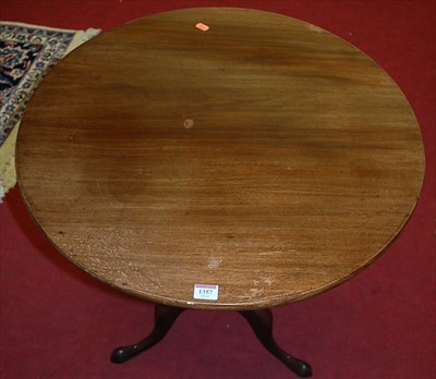 Lot 1357 - A 19th century mahogany circular tilt-top...