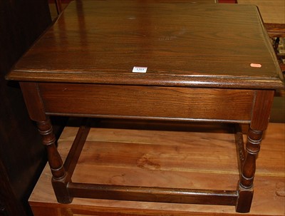 Lot 1361 - An oak single drawer low occasional table on...