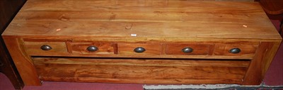 Lot 1362 - A contemporary hardwood five drawer low...