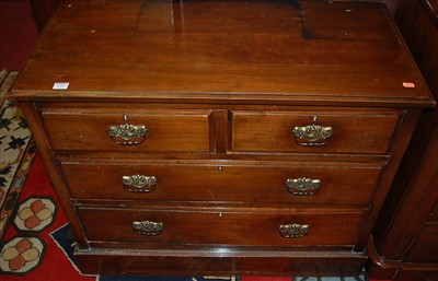 Lot 1373 - An Edwardian walnut low square front chest of...