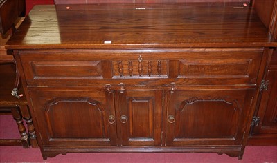 Lot 1383 - A contemporary moulded oak hinge top side...