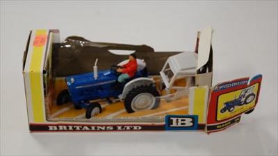 Lot 750 - A boxed Britains Ford tractor with cab (box...