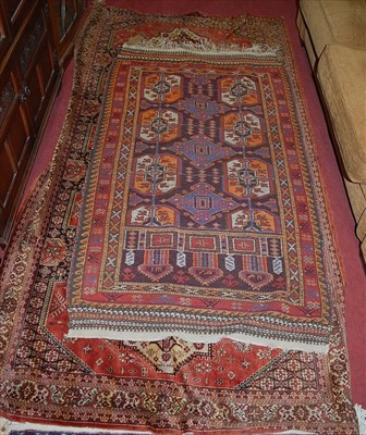 Lot 1387 - A Persian finely weaved red ground bokhara rug,...