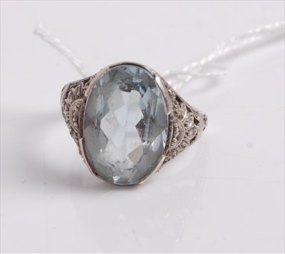 Lot 494 - A silver and aquamarine(?) set dress ring,...