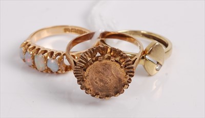 Lot 500 - A modern 9ct gold dress ring, inset with a...