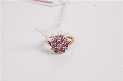 Lot 510 - A modern 9ct gold, ruby and diamond highlight...