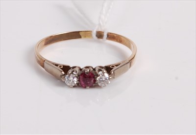 Lot 515 - A 9ct gold, ruby and diamond three stone ring,...