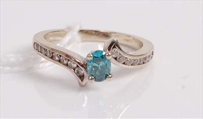 Lot 518 - A contemporary 14ct white gold, topaz and...