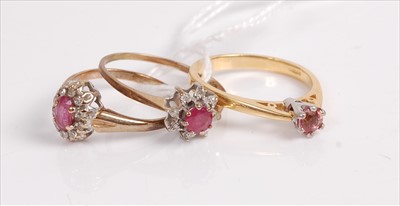 Lot 519 - A 9ct gold, ruby and diamond cluster ring;...