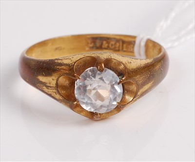 Lot 523 - A gilt metal and paste set dress ring, size T