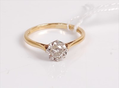 Lot 525 - An 18ct gold diamond solitaire ring, the...