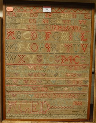 Lot 1052 - A William IV alphabet and number needlework...