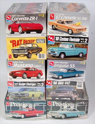 Lot 1544 - An AMT/ERTL 1/25 scale mixed car kit group,...