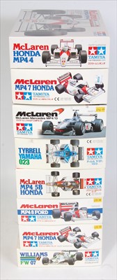 Lot 1552 - Eight various boxed as issued Tamiya 1/20...