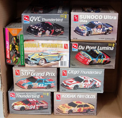 Lot 1555 - Nine various boxed as issued AMT/ERTL stock...