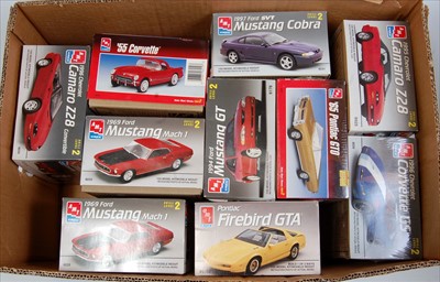 Lot 1557 - Ten various boxed as issued AMT/ERTL 1/25...