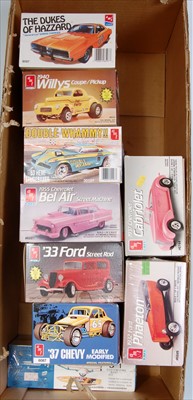 Lot 1568 - Nine various boxed as issued AMT Classic Car...