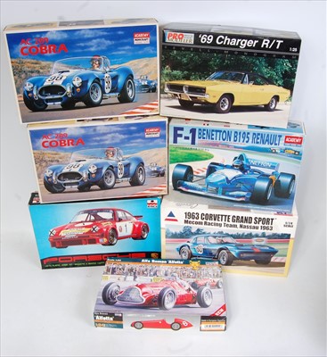 Lot 1458 - Seven various boxed mixed scale plastic car...