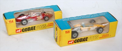 Lot 1618 - A Corgi Toys F1 racing car diecast group to...