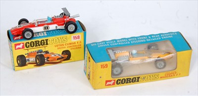 Lot 1619 - A Corgi Toys boxed F1 racing diecast group to...