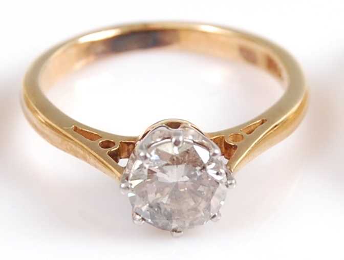Lot 2026 - A yellow and white metal diamond single stone...