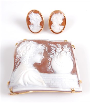 Lot 2049 - A yellow metal carved shell cameo brooch and...