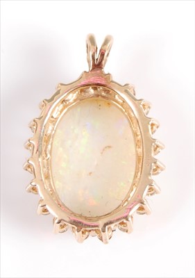 Lot 2001 - A yellow metal, opal and diamond cluster...