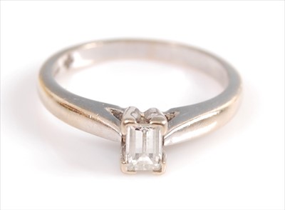 Lot 2003 - An 18ct white gold single stone diamond ring,...