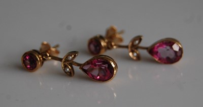 Lot 2069 - A pair of 9ct pink sapphire flower shaped drop...
