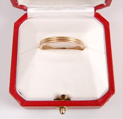Lot 2050 - An 18ct Cartier 'Trinity' ring, comprising...