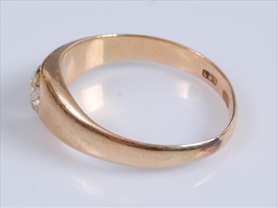 Lot 2051 - An 18ct yellow gold Gypsy set diamond ring,...