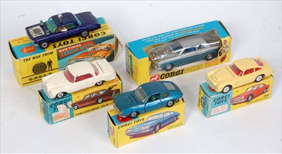 Lot 1628 - Five various boxed and playworn Corgi Toy...