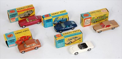 Lot 1631 - Five various boxed and playworn Corgi Toy...