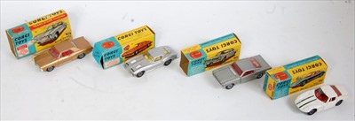 Lot 1632 - Four various boxed and playworn Corgi Toy...