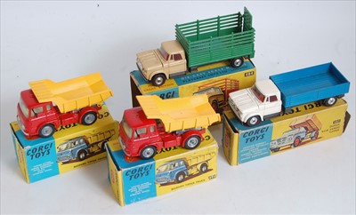 Lot 1638 - Four various boxed and playworn Corgi Toy...