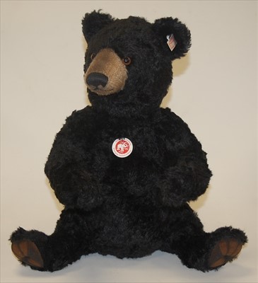 Lot 2313 - A modern Steiff 'Winnipeg Bear', in black...