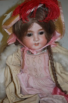 Lot 2091 - A large Max Handwerck bisque head doll, having...